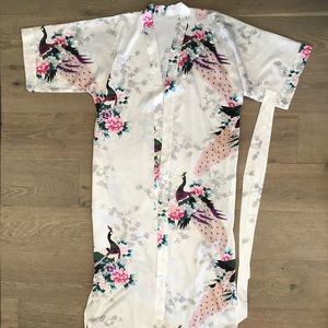 Kimono with peacocks on it